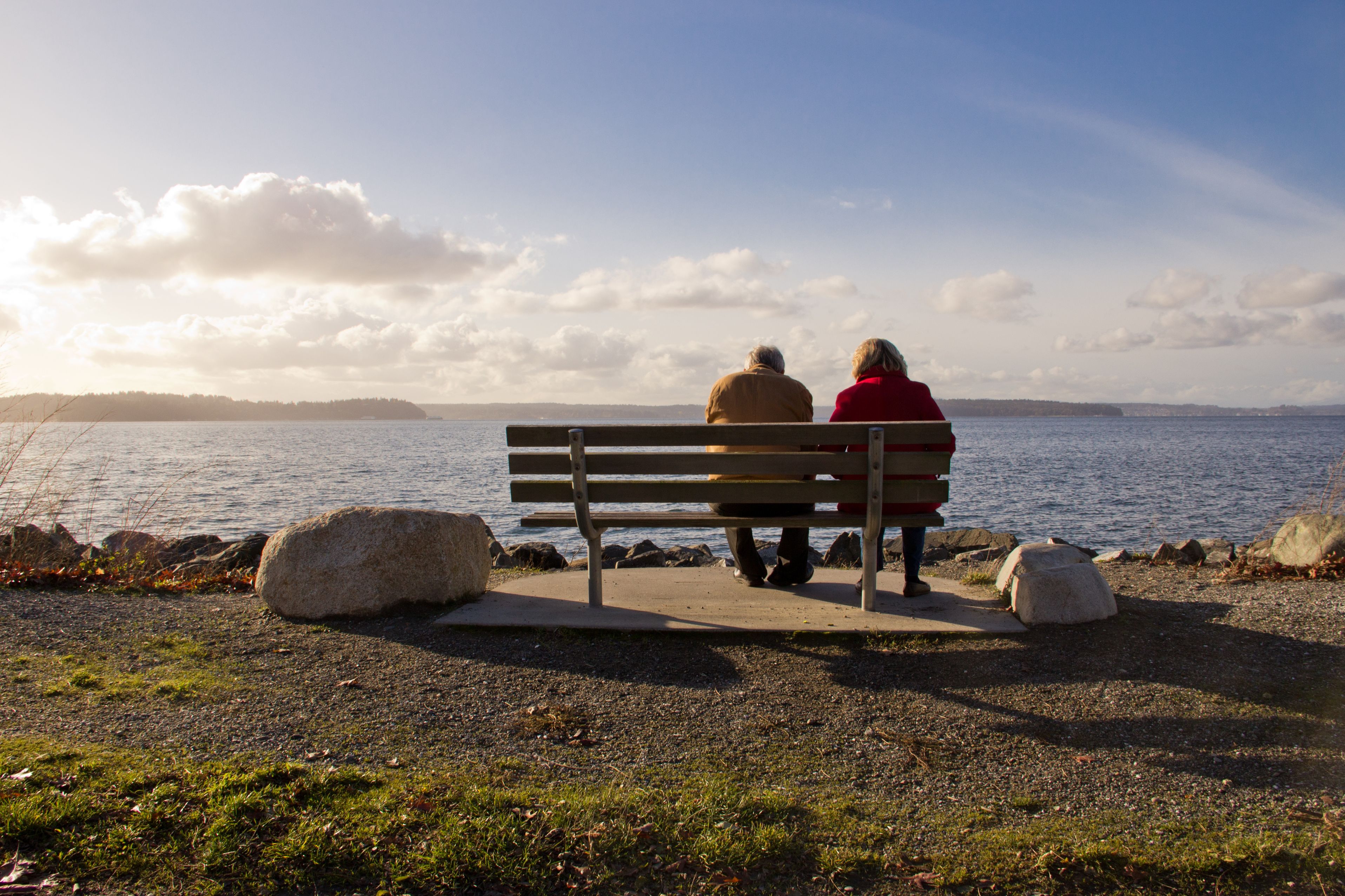 16435601 – an old man and woman enjoying the view at sunset